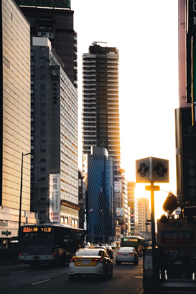 Home 5 Dynamic view of a busy city street with modern skyscrapers and traffic at sunset. Peoplefindersdaas working with fortune 500 comapanies.